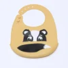 BABERO SILICONA AMARILLO ANIMALES