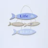 COLGANTE PECES MADERA 31.5X38 AZUL