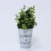 PLANTA FLOR VERDE ENVEJECIDO B 23CM