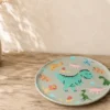 PLATO MELAMINA 21CM DINOSAURIO